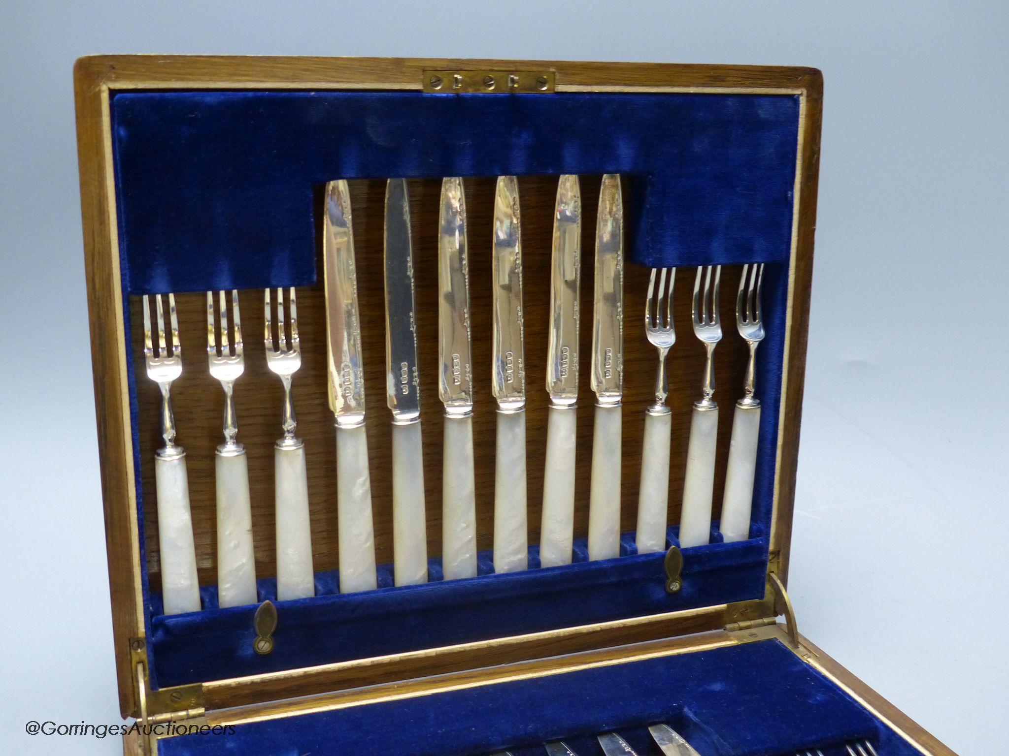 A cased set of George V mother of pearl handled silver dessert eaters, Frank Cobb & Co Ltd, Sheffield, 1927